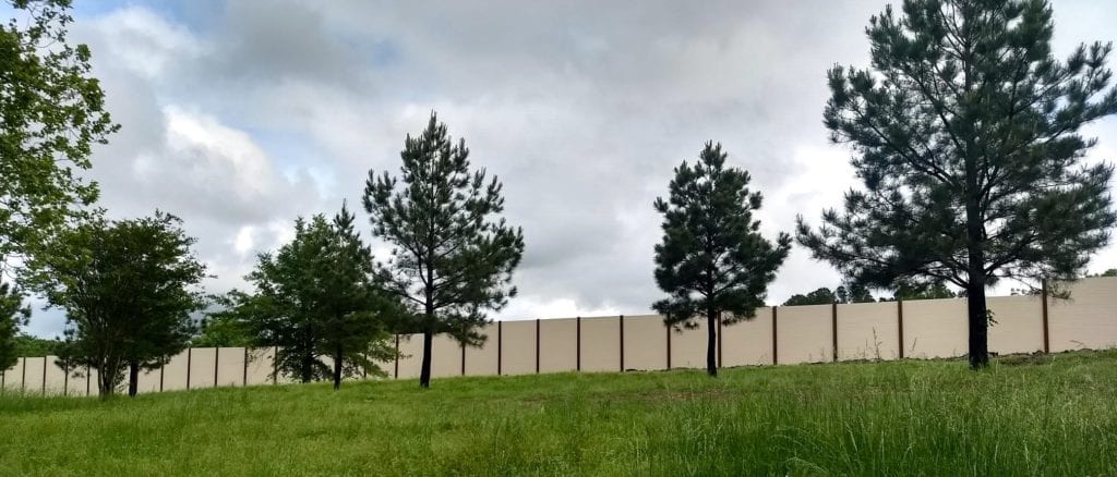 Wide view of sound barrier wall along I-630 for Arkansas DOT