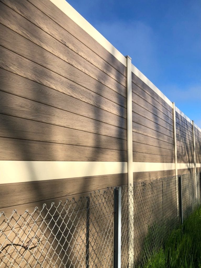 Close angle view of sound barrier wall along RV resort