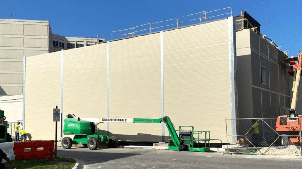 Wide view of sound barrier wall for generator building