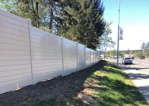 Street view of highway noise barrier wall in Campbell River