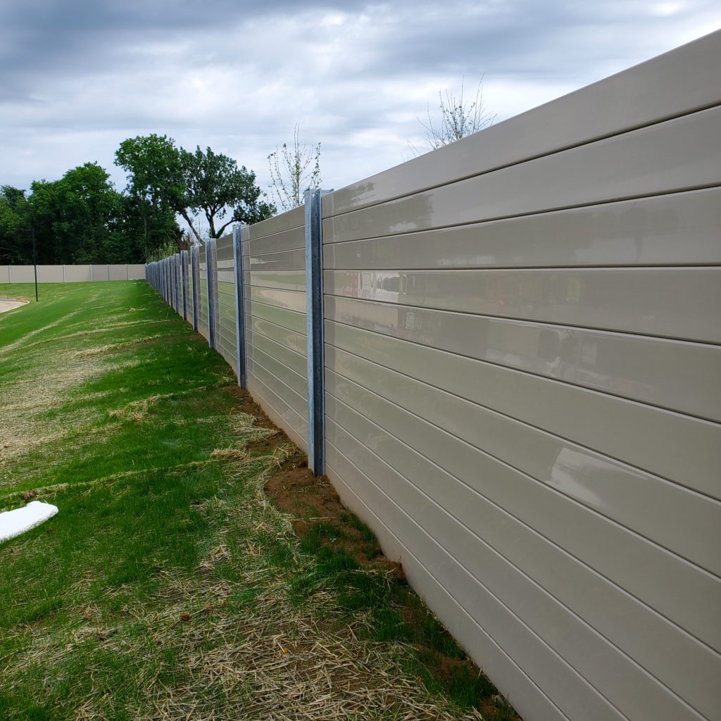 Lower section of distribution center noise barrier wall