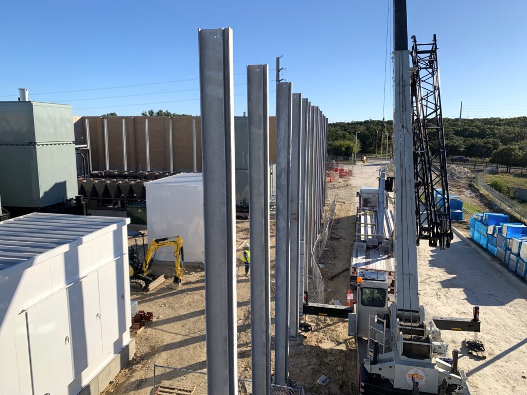 Construction view of sound barrier wall equipment enclosure