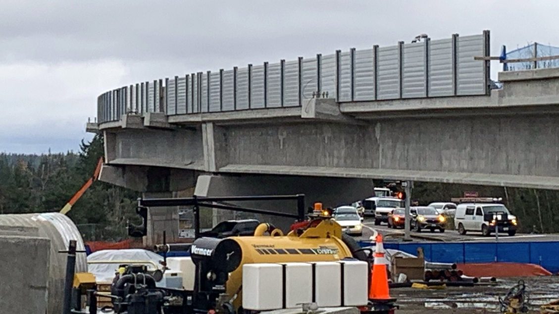 Wide outside view of sound barrier wall on LRT guideway