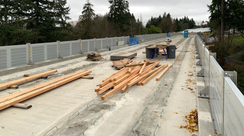 Wide inside view of noise barrier walls on LRT guideway