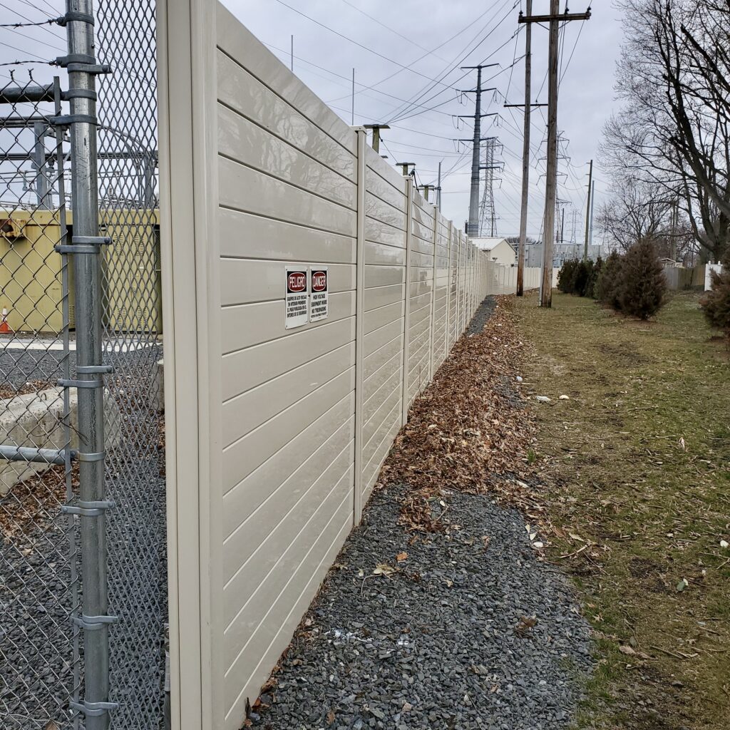End view of electrical switching station noise barrier wall