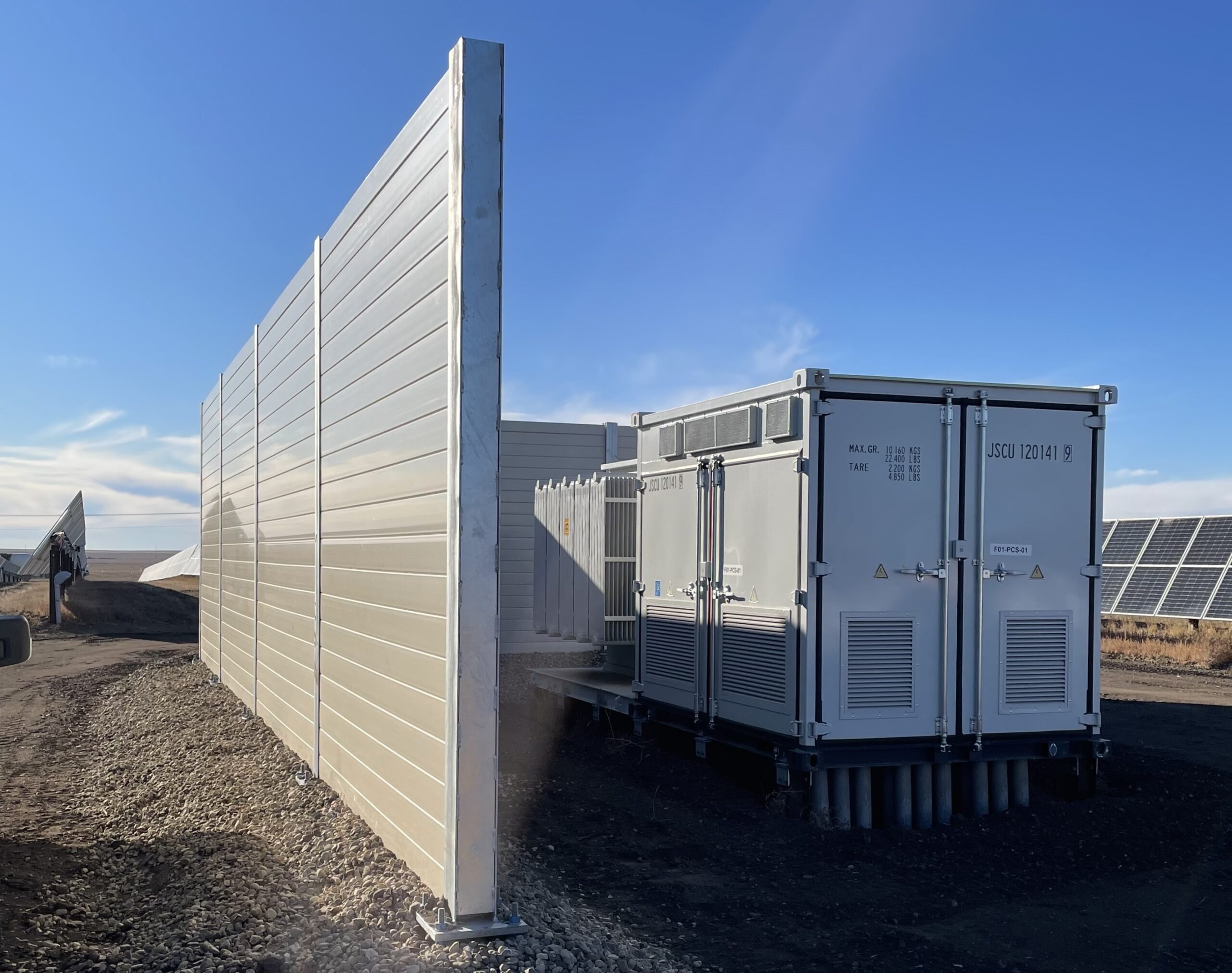 Closer view of solar farm noise barrier wall