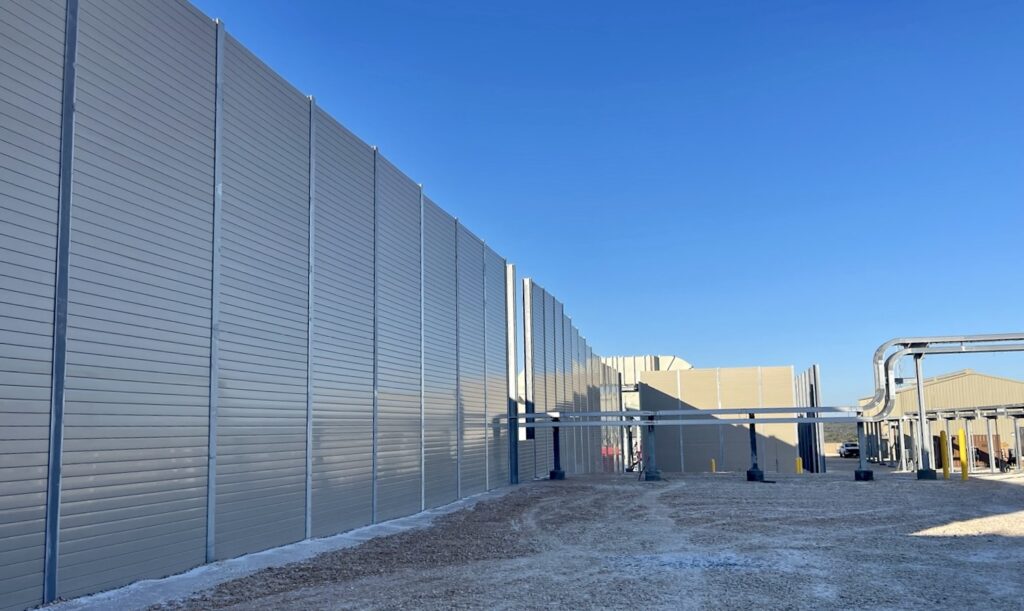 Wide view of sound wall for gas pipeline compressor station
