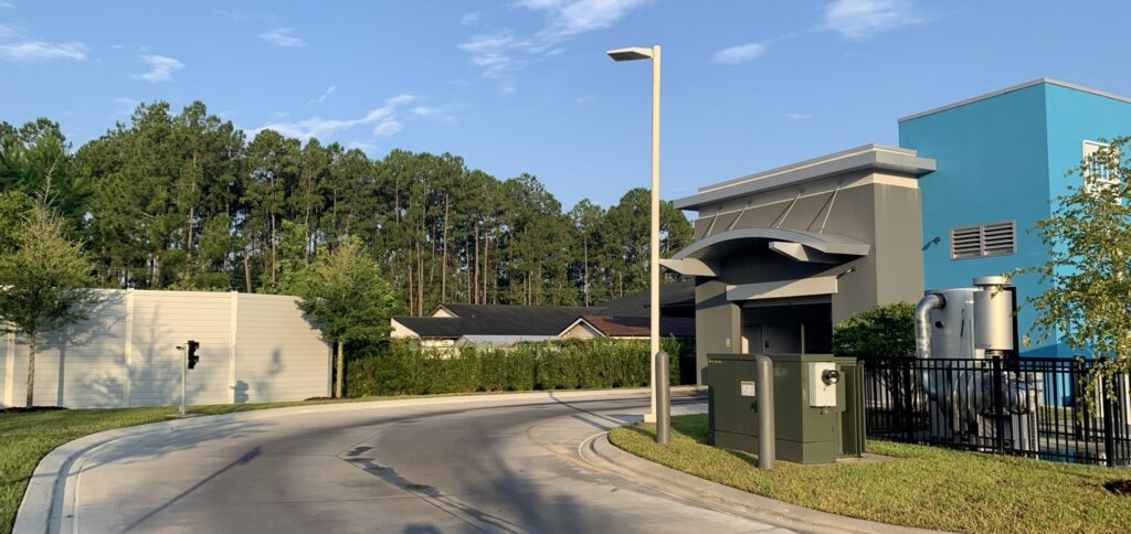 View of sound barrier wall for Gate Carwash